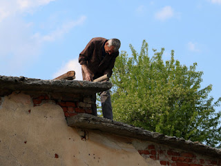 Sally working on the roof still Sally working on the roof still