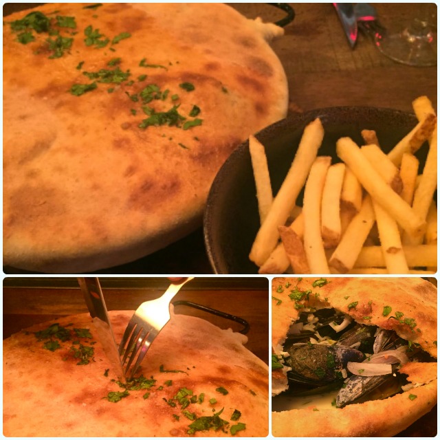 Mussels mariniere baked in a pizza crust with fries