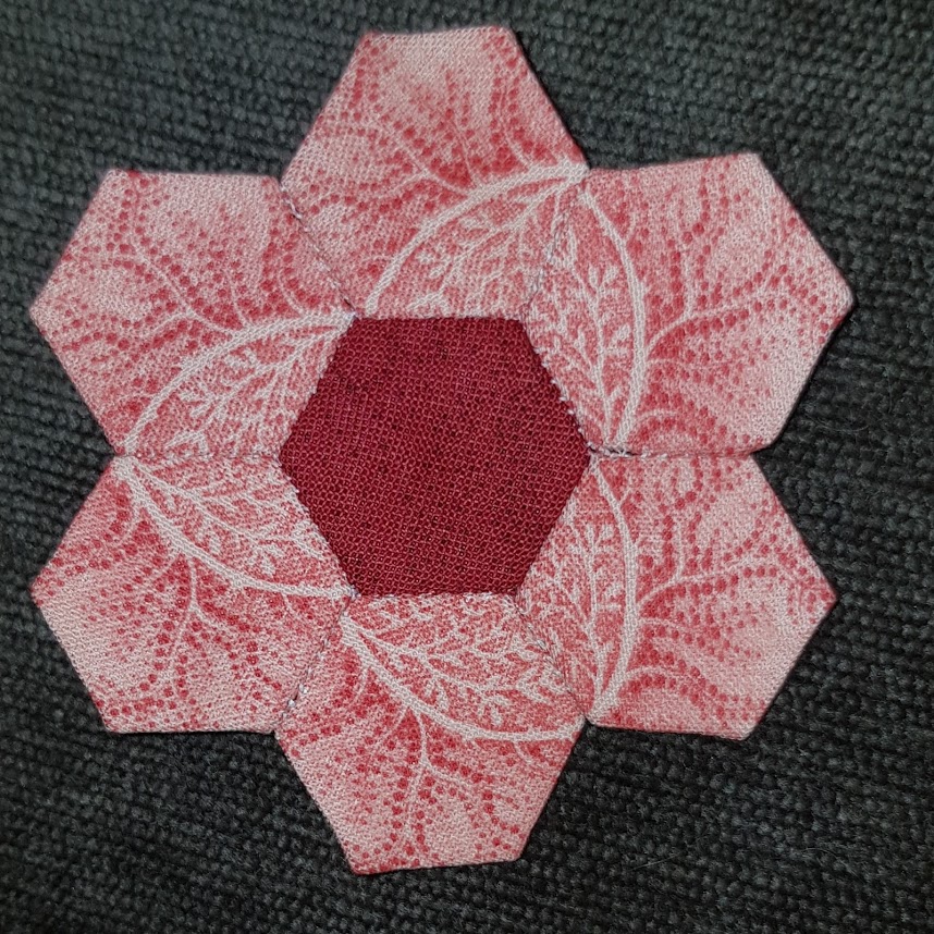 Feather On A Wire English Paper piecing and hexagons.