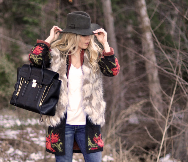 woodsy outfit in the woods, faux fur vest