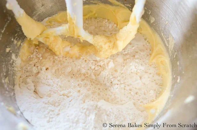 Boston Cream Pie recipe add flour and hot milk.