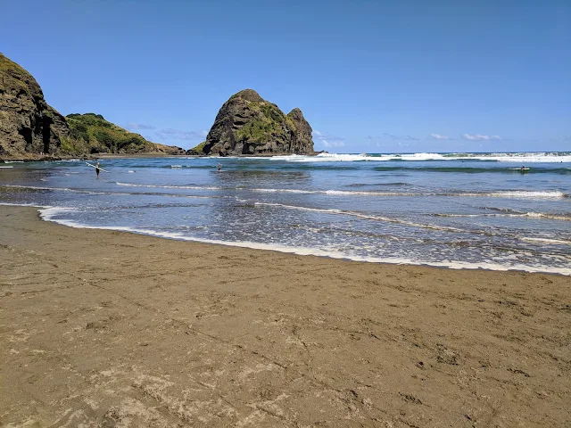 Tide coming in at Piha Beach near Auckland New Zealand