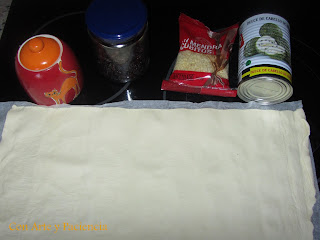 Triángulos de hojaldre rellenos de cabello de angel