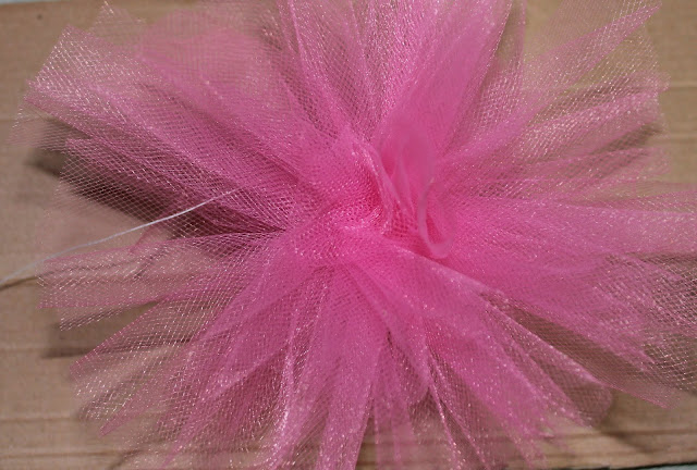 cutting out tulle pom-pom