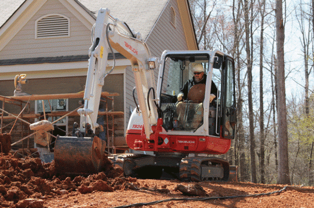 How to drive smart to extend the life of your excavator Takeuchi TB240 Excavator digging on construction site