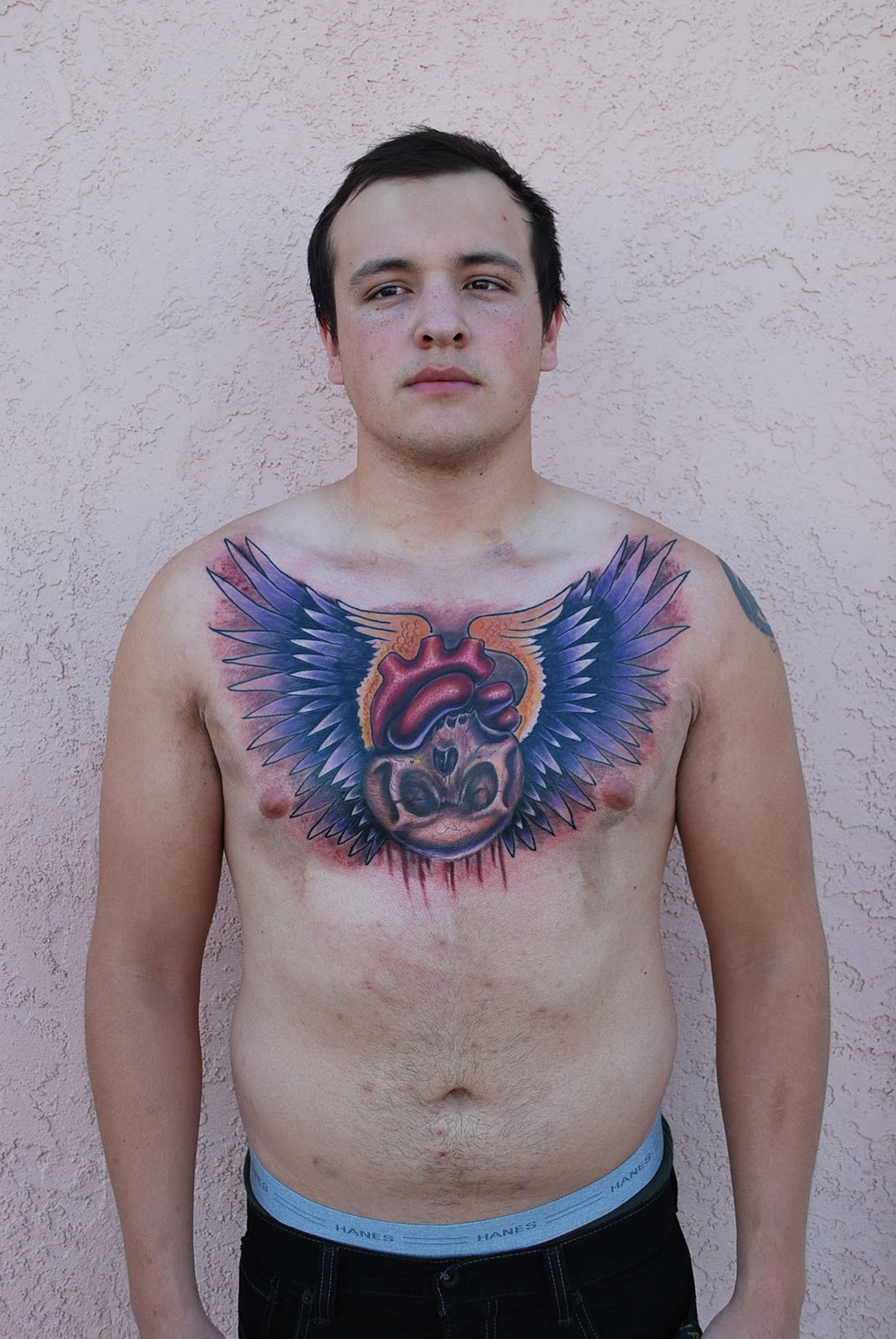 http://4.bp.blogspot.com/-XdPaQb82xs8/Tr1-NgKagyI/AAAAAAAAAKg/D-zk6heofww/s1600/Frontview+Freehand+Skull+Anatomical+Heart+and+Wings+Chest+Tattoo.jpg