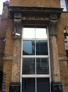 Ghost sign to the women's entrance to the Providence Row Night Shelter and Refuge, Spitalfields, London