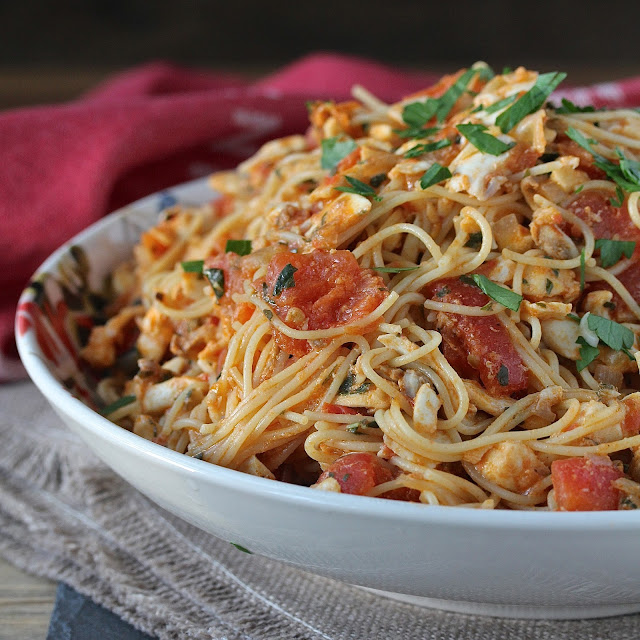 This Spicy Angel Hair Pasta with Halibut and Tomatoes is such a satisfying Mediterranean style dish. This Spicy Angel Hair Pasta with Halibut and Tomatoes is such a satisfying Mediterranean style dish.