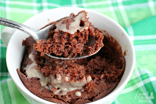 Ready in less than 3 minutes, this Bailey's Nutella Mug Cake is a fudgy, yet fluffy chocolate cake for one that is drizzled with a simple Irish cream glaze.