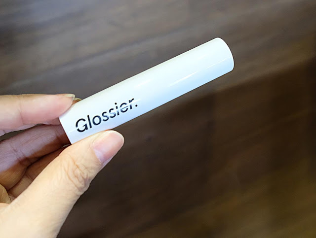 a photo of Glossier Generation G Sheer Matte Lipstick Review