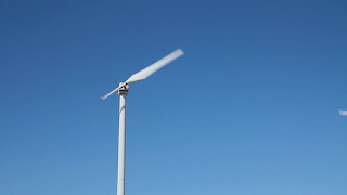 static shot of a single blade wind turbine on a windy day hulyf5vjl thumbnail full01