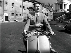Gregory Peck and Audrey Hepburn rode around Rome on  a Vespa motor scooter in the 1953 film, Roman Holiday