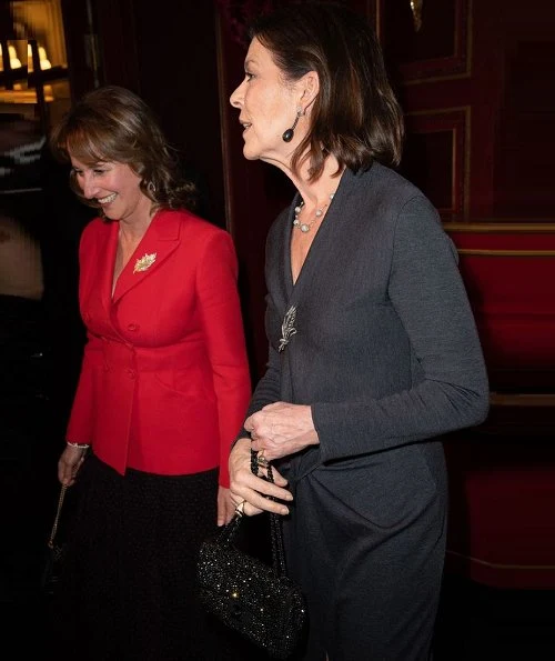 The Princess attend a party at Le Grand Hotel in Paris. Princess Caroline of Monaco wore a gray maxi dress by Prada