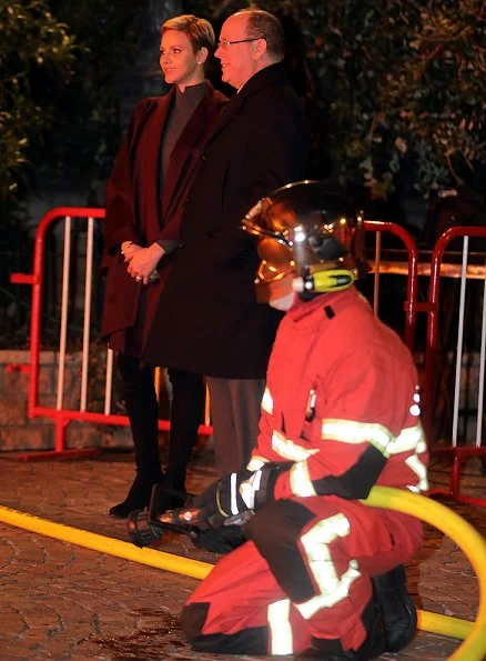 Princess Charlene and Prince Albert attend the traditional 2017 Sainte Devote procession in Monaco. Wore Akris cape