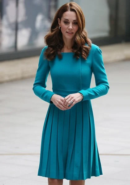 Kate Middleton is repeating her teal Emilia Wickstead dress and her Asprey leaf earrings. Kate is wearing a teal Emilia Wickstead dress