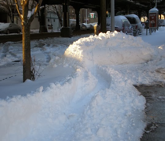 snow drifts on street