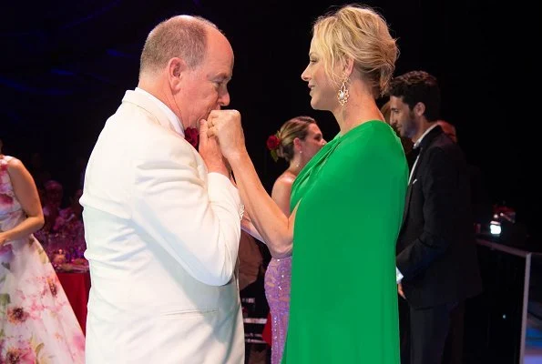 Princess Charlene wore a new green cape effect crepe gown by Marchesa. Princess Charlene wore Marchesa notte green cape effect crepe gown