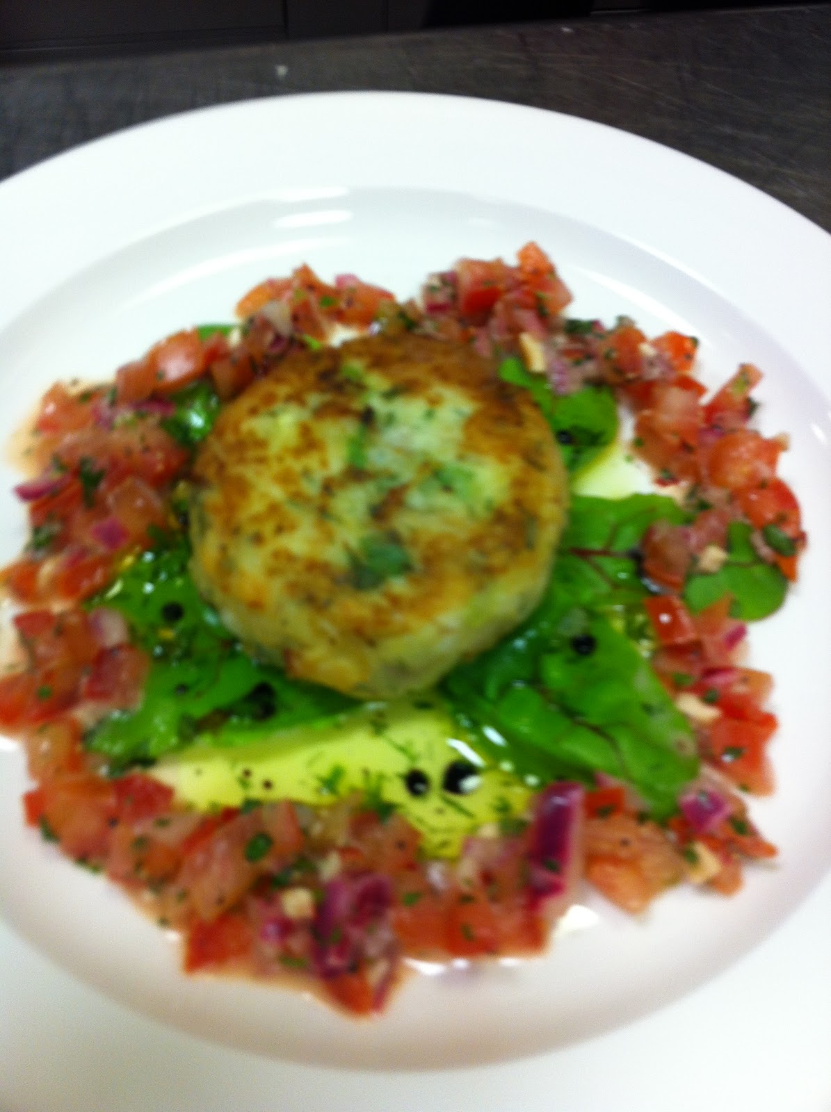 behind the frying pan Smoked haddock and cod fishcake,tomato red onion