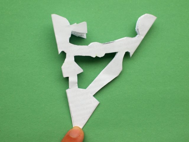 Two ways to make paper people chains (a chain and a snowflake design)