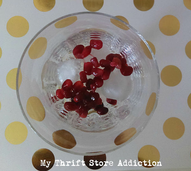 Learn how to make this festive rosemary pomegranate mocktail that can be served at your Valentine's Day table and enjoyed again as the weather gets warmer! refreshing rosemary pomegranate mocktail