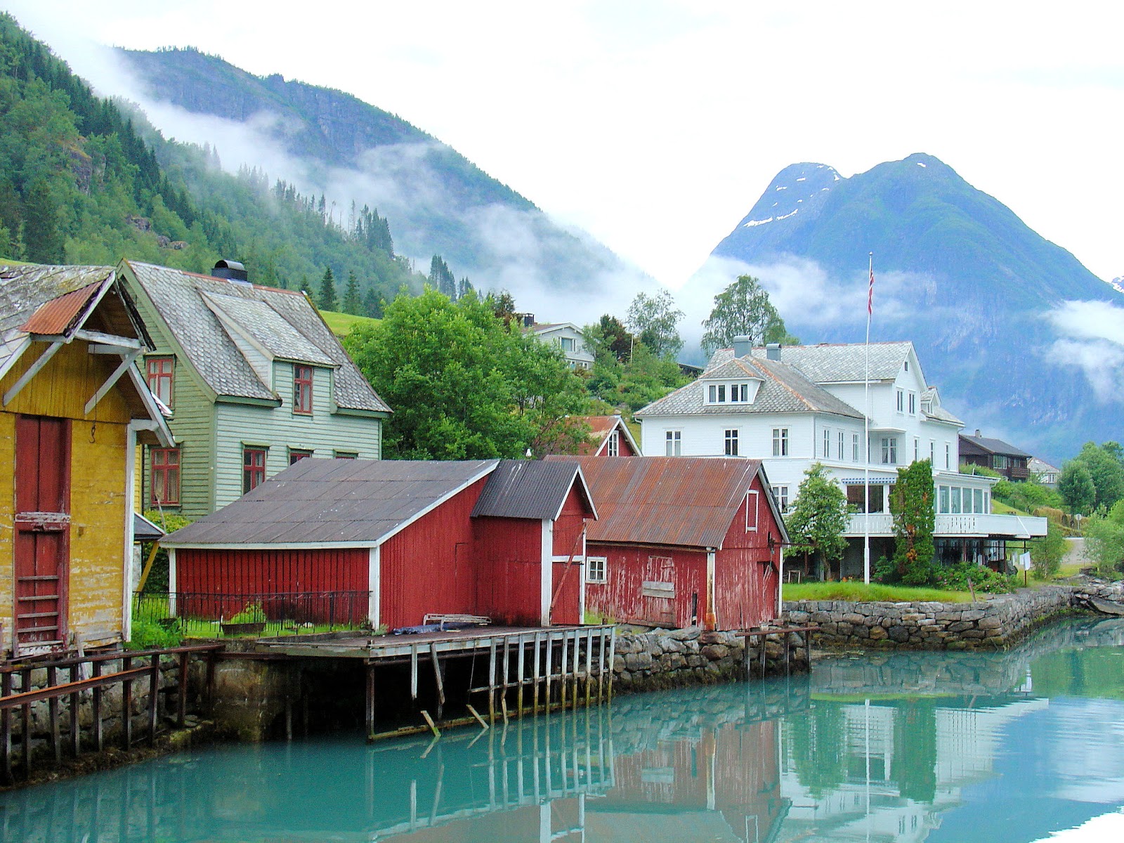 Welcome to Fjærland, Norway, one of the most charming and picturesque ports in Norway. The Fjordstuer Hotel can be seen in the background.