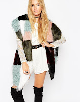 http://www.asos.com/asos/asos-faux-fur-multi-patchwork-oversized-scarf/prod/pgeproduct.aspx?iid=5245557&clr=Multi&SearchQuery=fur+scarf&pgesize=17&pge=0&totalstyles=17&gridsize=3&gridrow=4&gridcolumn=3