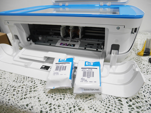 The printer comes with 2 ink cartridges, one black and one colour cartridge