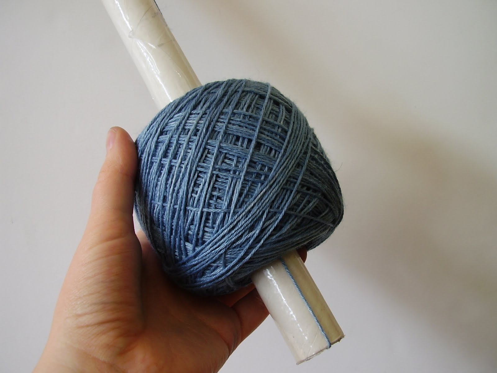 Winding yarn by hand