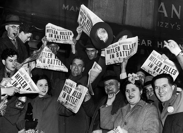 The subway rush hour is brought to a standstill in New York City, May 1, 1945 as the report of Hitler's death was received. The German leader and head of the Nazi Party had shot himself in the head in a bunker in Berlin on April 30, 1945. His successor, Karl Dönitz, announced on German radio that Hitler had died the death of a hero, and that he would continue the war against the Allies.