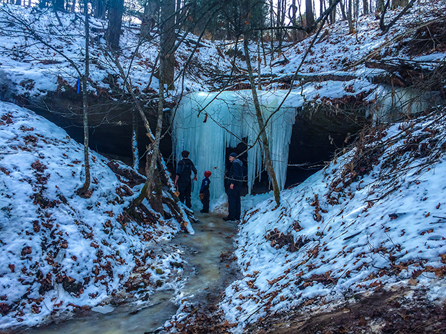 A family explores a Kickapoo Valley Reserve Ice Cave - K2  on the maps on this page