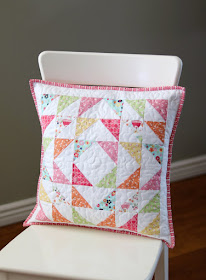 Quilted patchwork pillows made by Andy of A Bright Corner