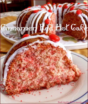 Cinnamon Red Hot Cake is simple to make, change up a boxed cake mix with cinnamon flavors, add a drizzled topping studded with red hots. | Recipe developed by www.BakingInATornado.com | #recipe #cake #ValentinesDay