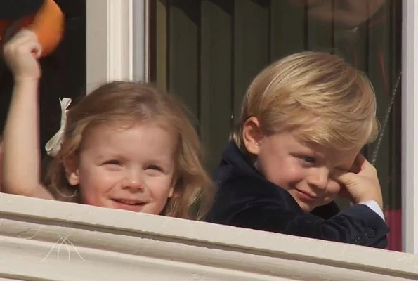 Crown Prince Jacques and Princess Gabriella watched the celebrations from the window of the Palace