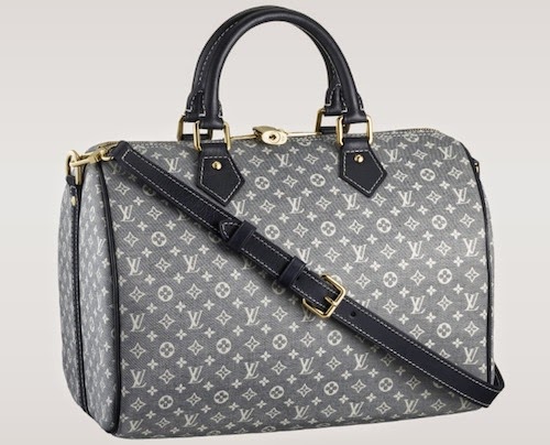 Women handbags addict: Nicki Minaj’s Heathrow Airport Louis Vuitton