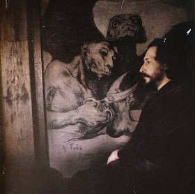 Фотографический автопортрет Леонида Андреева на фоне нарисованной им же копии Капричос Гойи