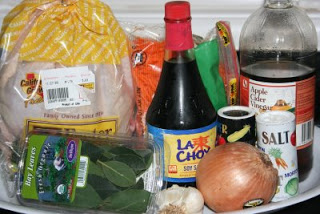 the ingredients for making chicken adobo in the crockpot slow cooker