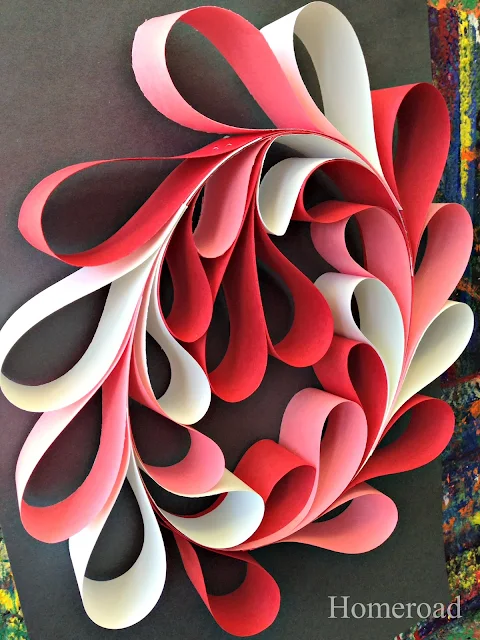 pink, red, and white paper heart wreath