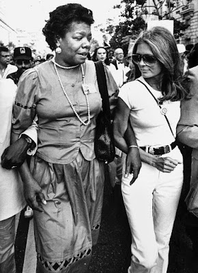 Maya Angelou and Gloria Steinman walking in civil rights