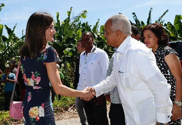 Queen Letizia wore Uterque floral jumpsuit and Magrit pumps and Uterque Bag