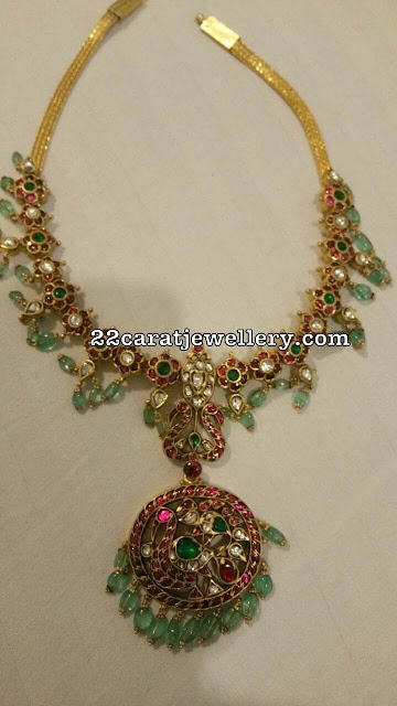 Floral Kundan Necklace with Light Emerald Drops Floral Kundan Necklace with Light Emerald Drops