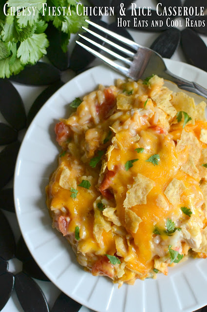 A delicious and family friendly casserole! Perfect for those busy weeknights or even Sunday dinner! Budget friendly too! Cheesy Fiesta Chicken and Rice Casserole Recipe from Hot Eats and Cool Reads