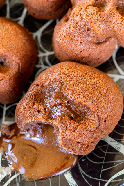 Chocolate Lava Skull Cakes - seriously delicious and PERFECT for your Halloween parties! Only 5 simple ingredients - chocolate chips, butter, eggs, powdered sugar, flour. They only take a minute to whip up and are ready to eat in about 15 minutes. Serve the cakes with some whipped cream and/or vanilla ice cream. Delicious and frightfully festive!! #halloween #chocolate #chocolatelavacake #cake #quickdessert Chocolate Lava Skull Cakes - seriously delicious and PERFECT for your Halloween parties! Only 5 simple ingredients - chocolate chips, butter, eggs, powdered sugar, flour. They only take a minute to whip up and are ready to eat in about 15 minutes. Serve the cakes with some whipped cream and/or vanilla ice cream. Delicious and frightfully festive!! #halloween #chocolate #chocolatelavacake #cake #quickdessert