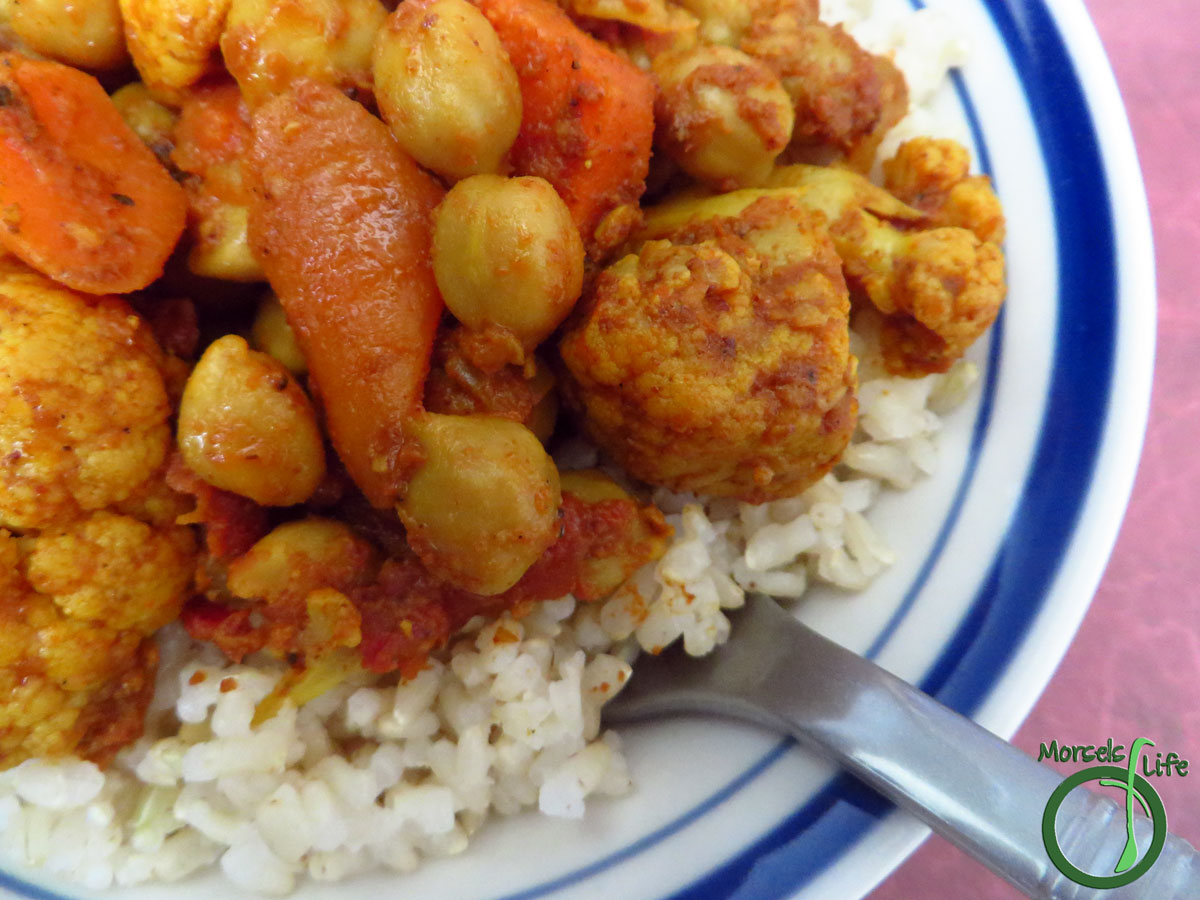 Morsels of Life - Cauliflower Carrot Curry - Cauliflower, cooked up with carrots, tomatoes, and chickpeas in a thick curry sauce containing garlic, ginger, and onion for one flavorful cauliflower carrot curry.