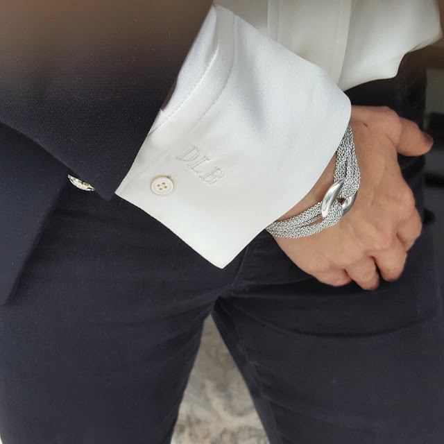 silk shirt and black blazer