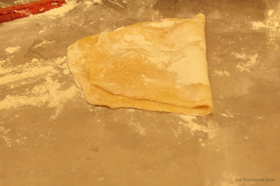 folding over the flour, dough