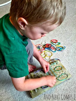 Playing on a homemade geoboard from And Next Comes L