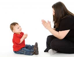 Pat a Cake helps develop sitting skills Core strength improves when playing Pat a Cake