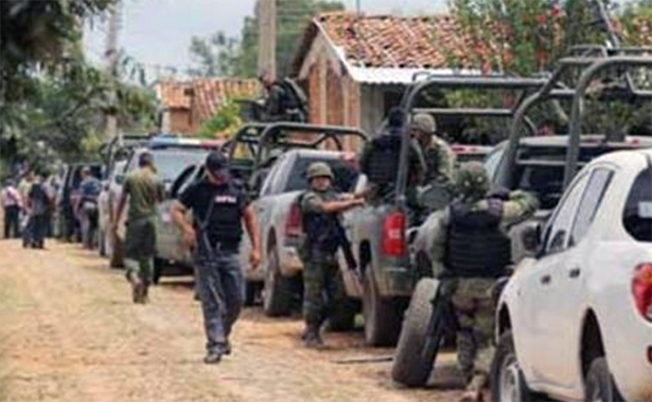 GUERRERO: 8 ejecutados más por comando narcoterrorista (En México según el gobierno NO HAY TERRORISTAS) Screen%2BShot%2B2016-12-20%2Bat%2B12.29.47