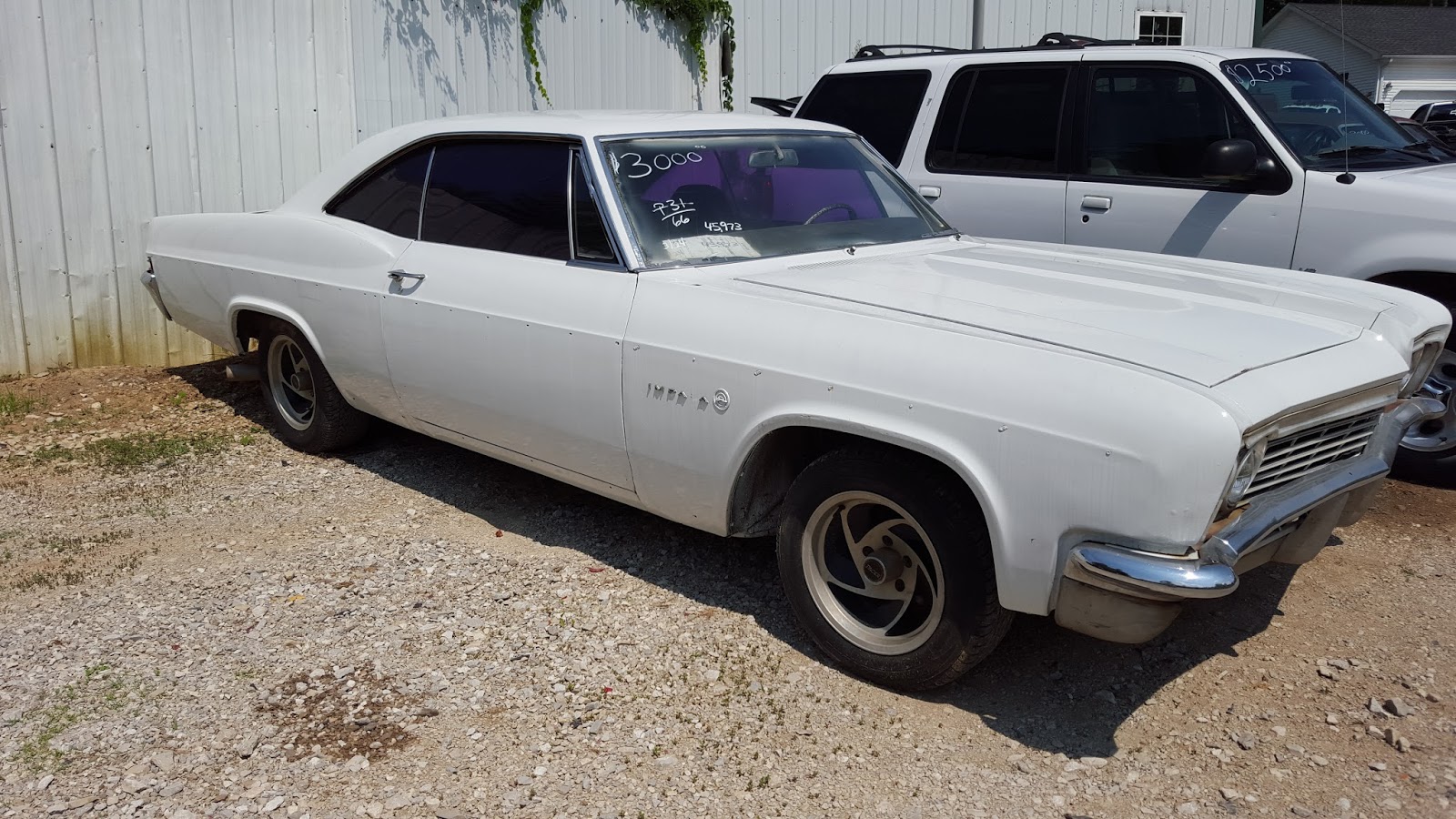 Vintage White Chevy Impala | Brooks Auto Sales And Salvage