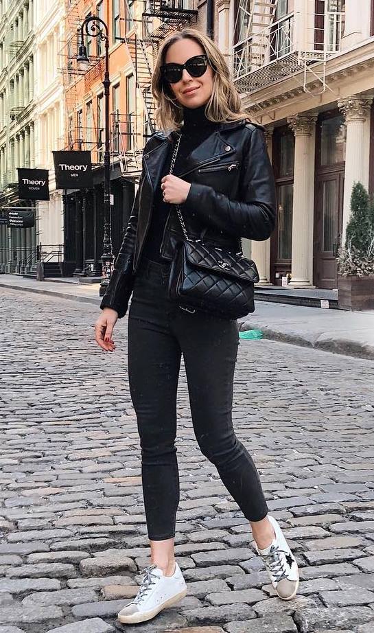fall casual outfit / sneakers + skinny jeans + bag + moto jacket + top